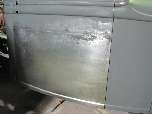 Door skin TIG welded in and edges crimped to create door gaps